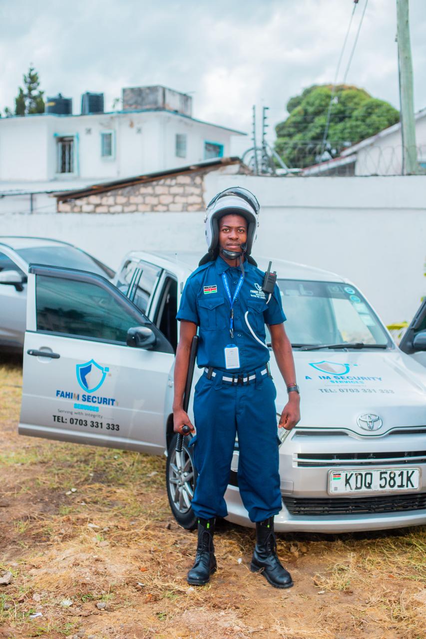 Fahim Security officer with the branded patrol vehicle
