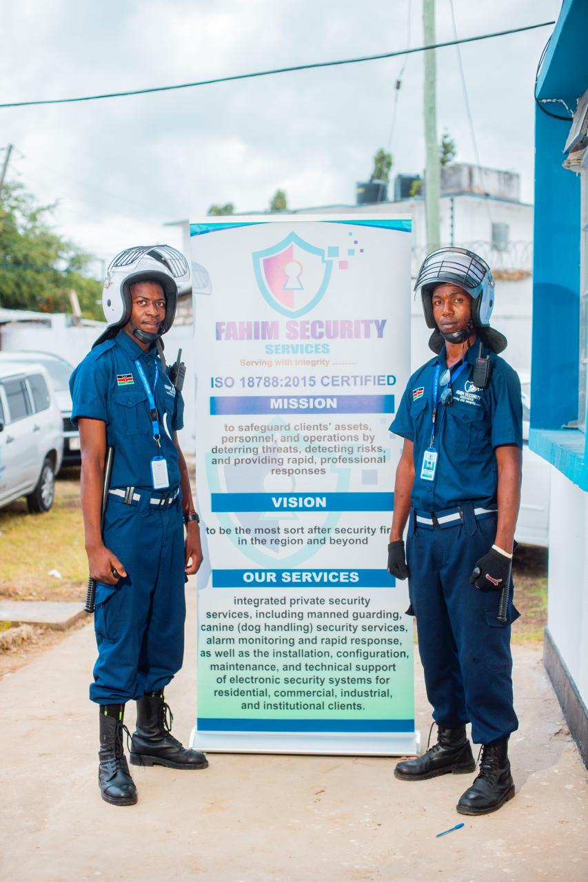 Two Fahim Security officers on duty